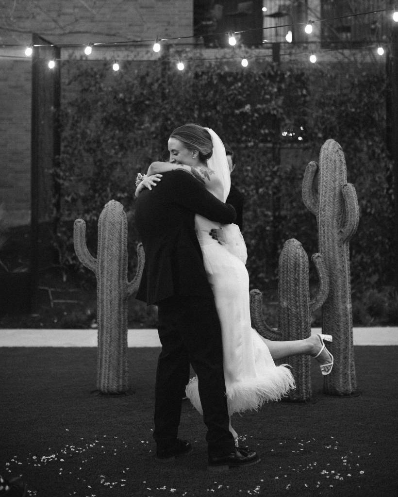 The cactus decor? The records used for the seating chart? The venue? We are obsessed!!! Alex and Kylen got married