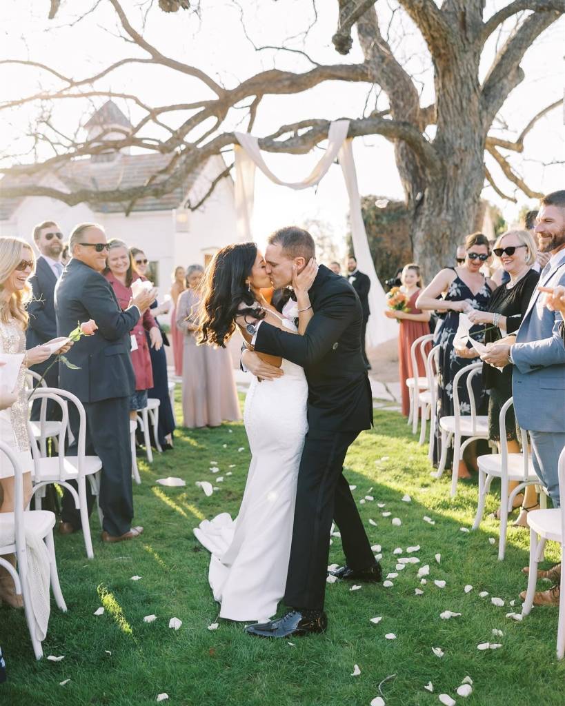 Cat & Jason had the most perfect spring wedding planned by planoniteventsanddesign! From the outdoor ceremony with draping over the