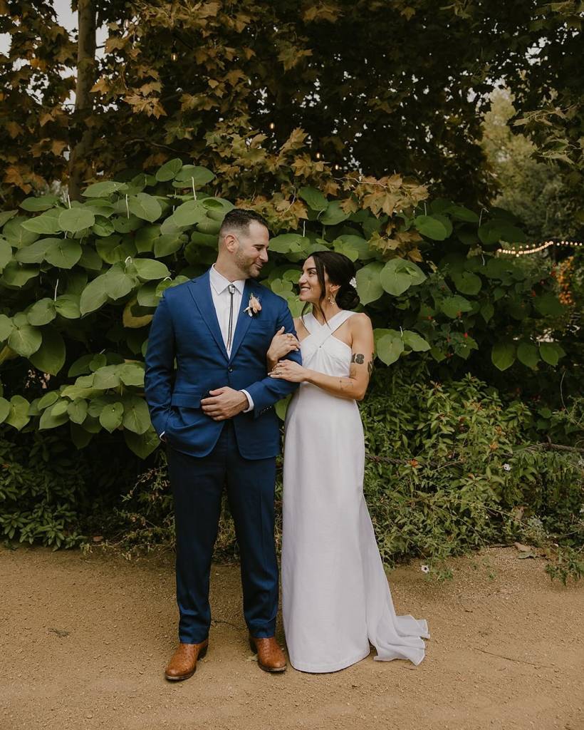 Sara & John had a stunning outdoor ceremony at springdalestation, complete with a mariachi band, custom papel picados (intricate banners),